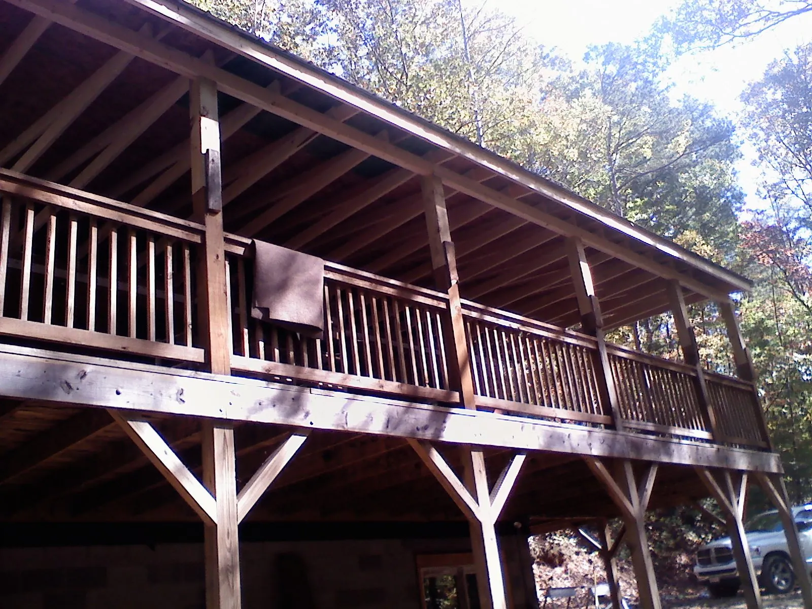 Timber framing under a new elevated porch and deck — Roof Leak Repair in Sanford by Roofing Brothers